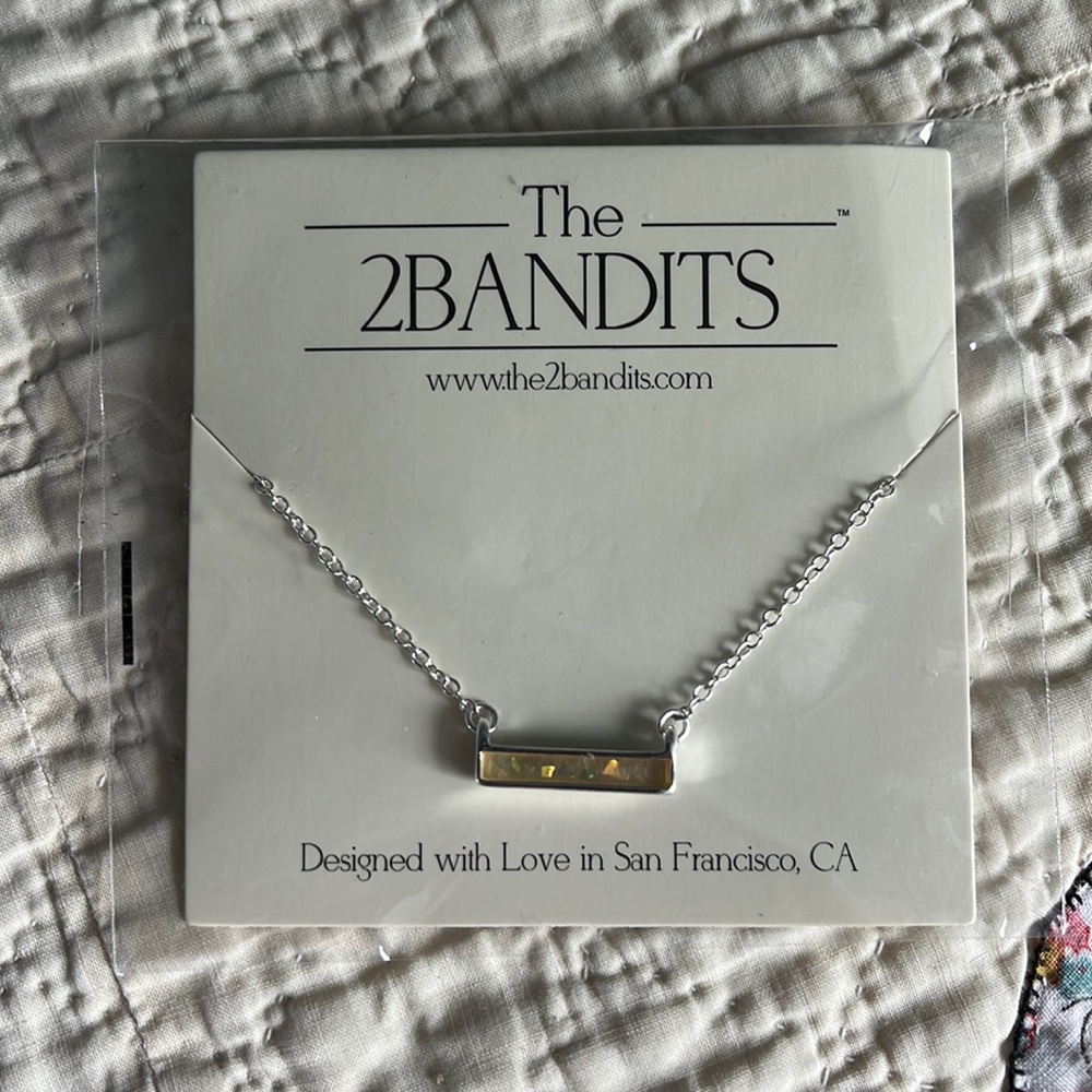 The 2Bandits necklace, new in package